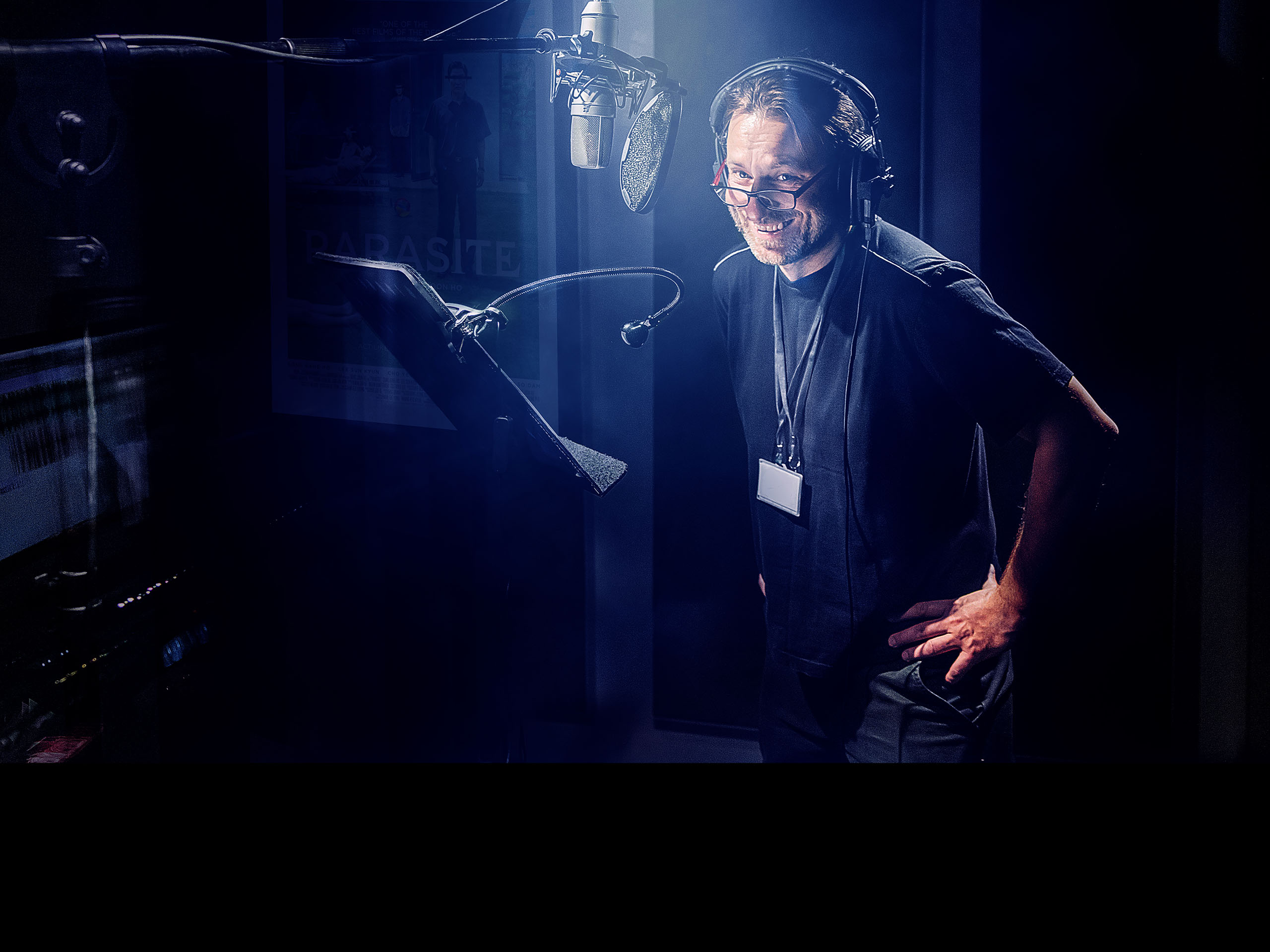voice artist, recording session, microphone, smiling
